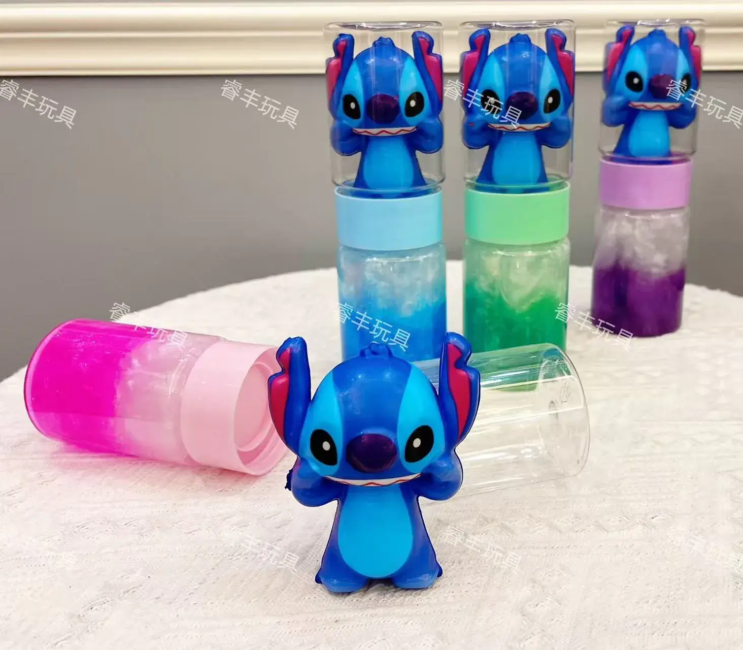 Zabawki Slime Stitch z figurką w butelce, 12 szt/paczka