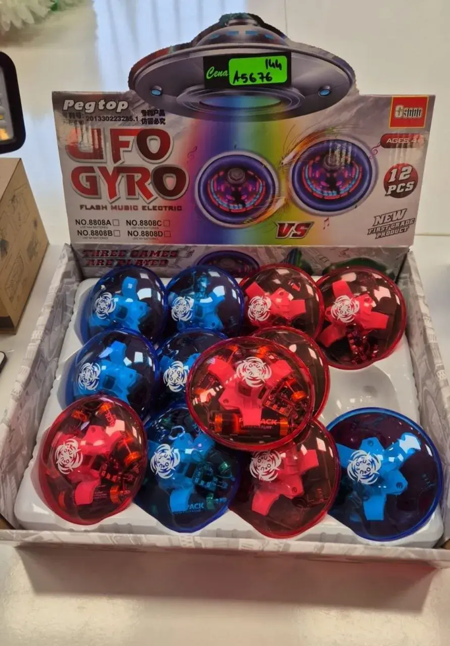 UFO Gyro na Baterie Muzyczny Baby Shark - Świecący Bączek 12szt