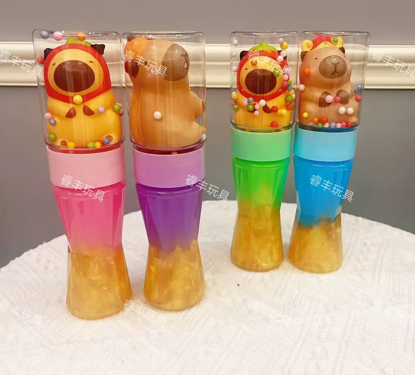 Zabawki Slime Kapibara w butelce z figurką i kuleczkami, 12 szt.