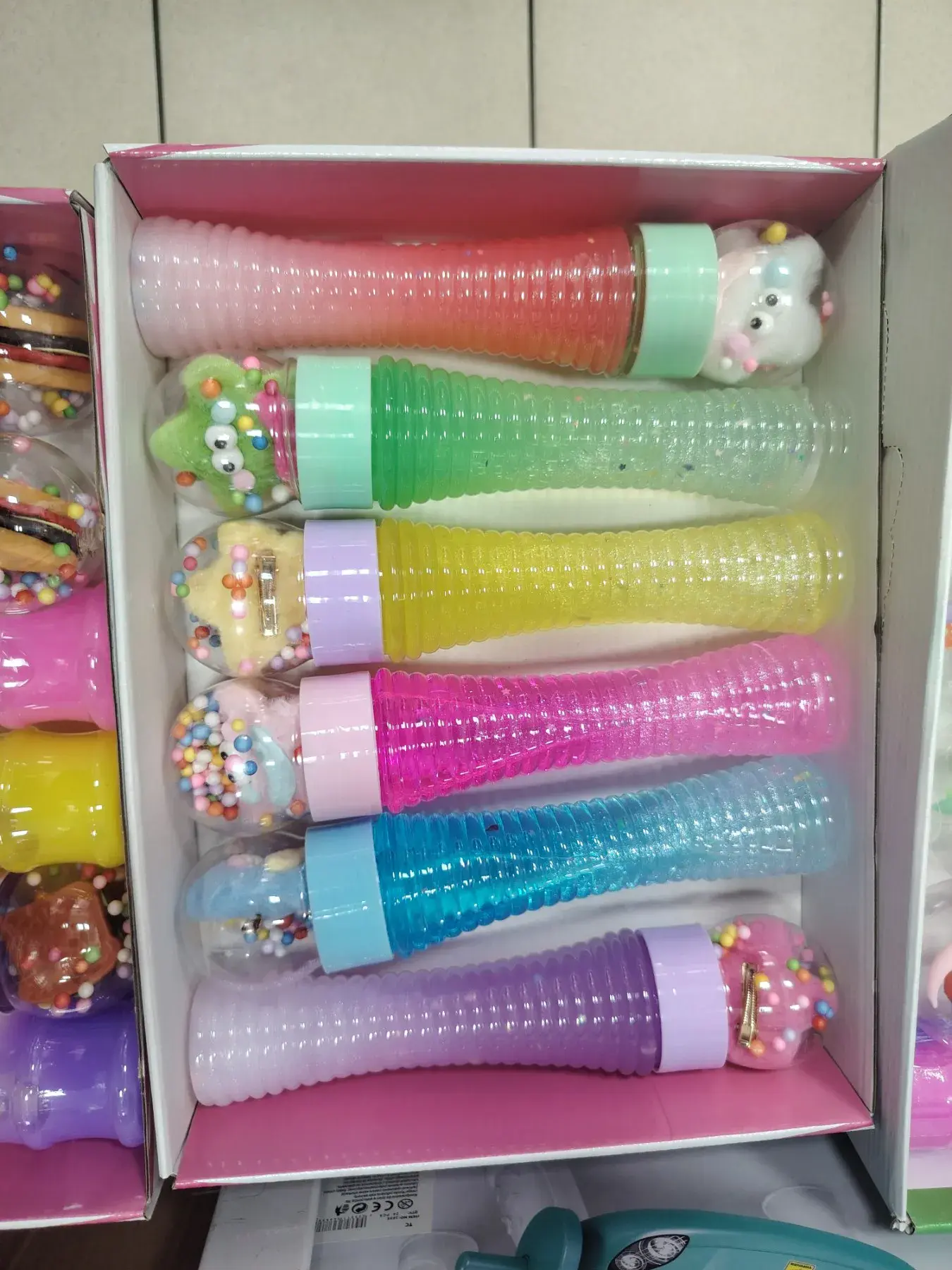 Zabawki Slime w tubach z brokatem i ozdobami, 12 szt
