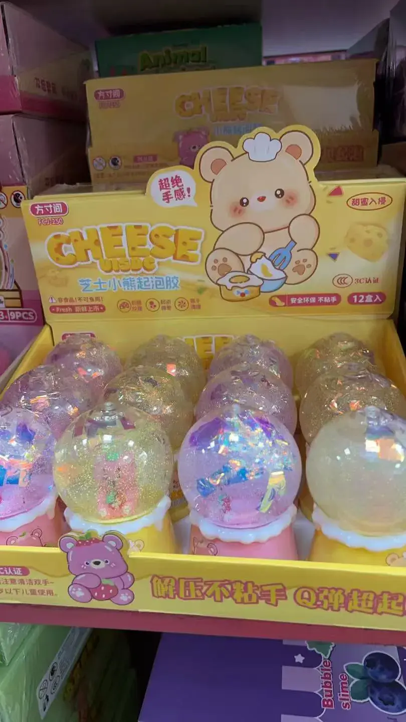 Zabawki Slime Cheese w kuli brokatowej, 12 szt