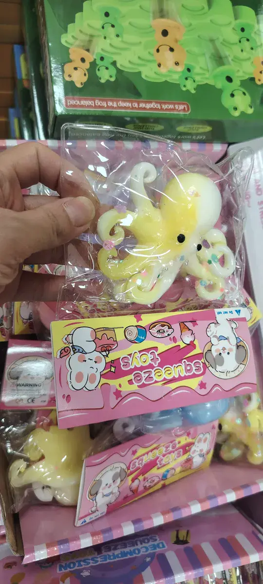 Miękka żółto-biała ośmiornica antystresowa Squeeze Toys