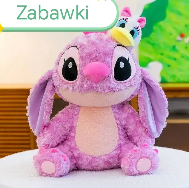 Pluszowy różowy stworek z ozdobą 50cm