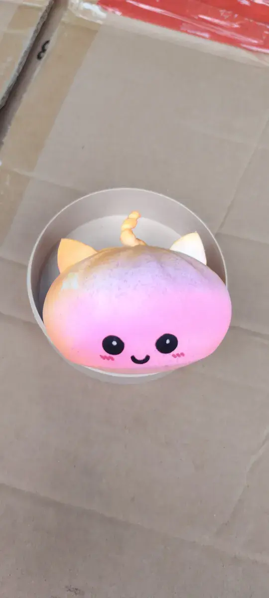 Miękka zabawka squishy różowo-pomarańczowa z uszami i ogonkiem