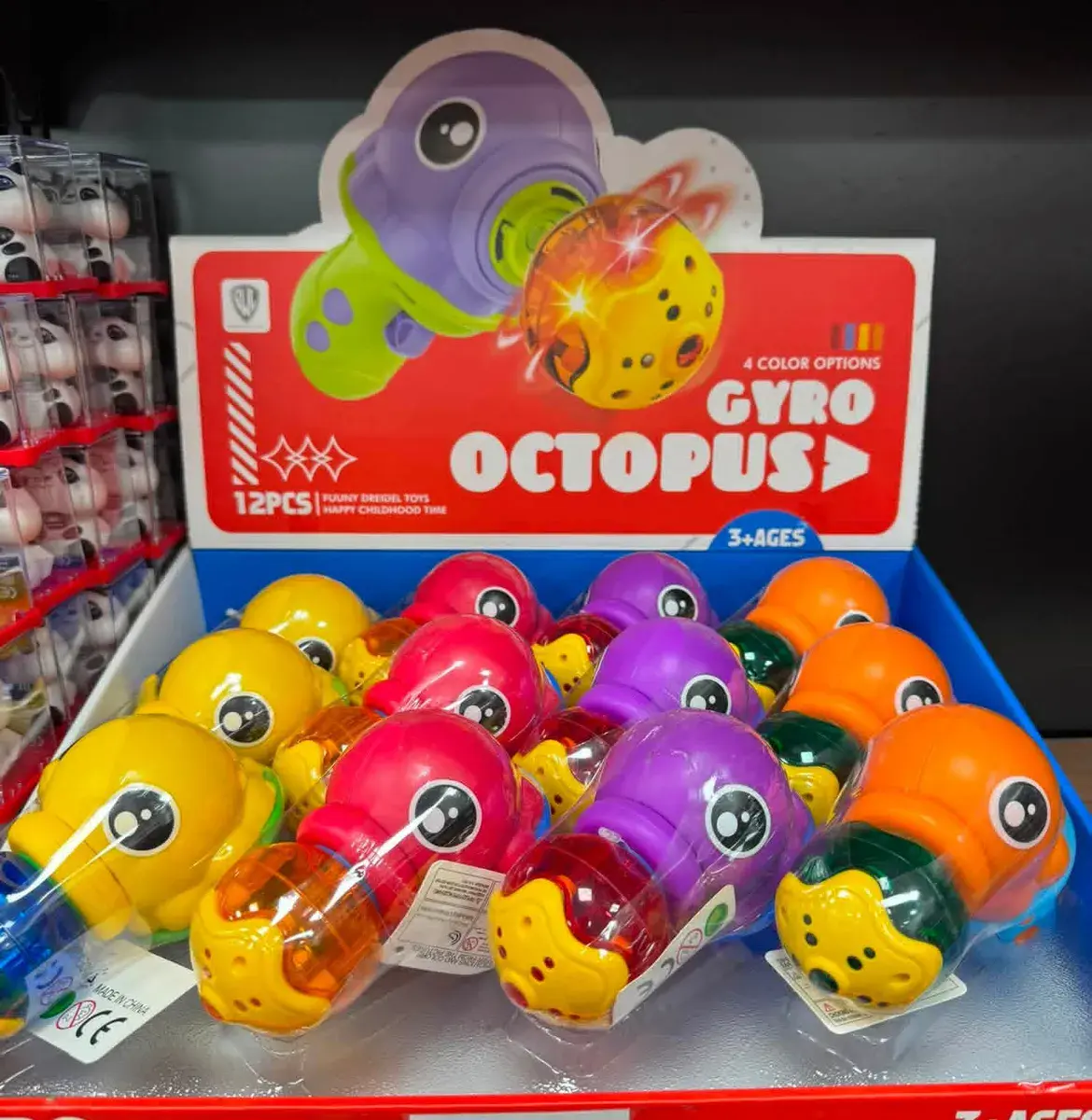 Kolorowa zabawka Gyro Octopus z wirującą kulą, 12 sztuk