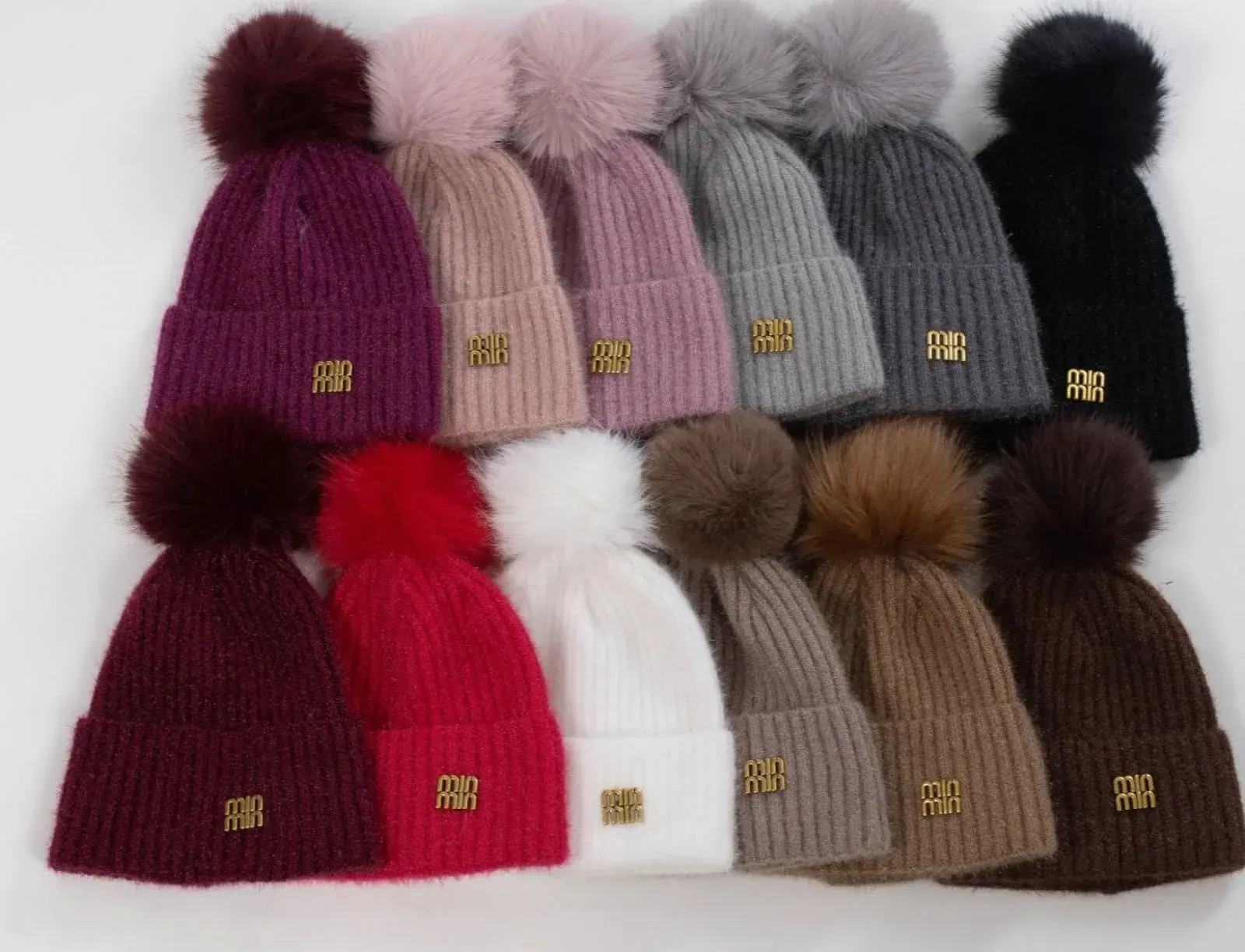 Czapki damskie z pomponem i logo MONCLER, 12 szt