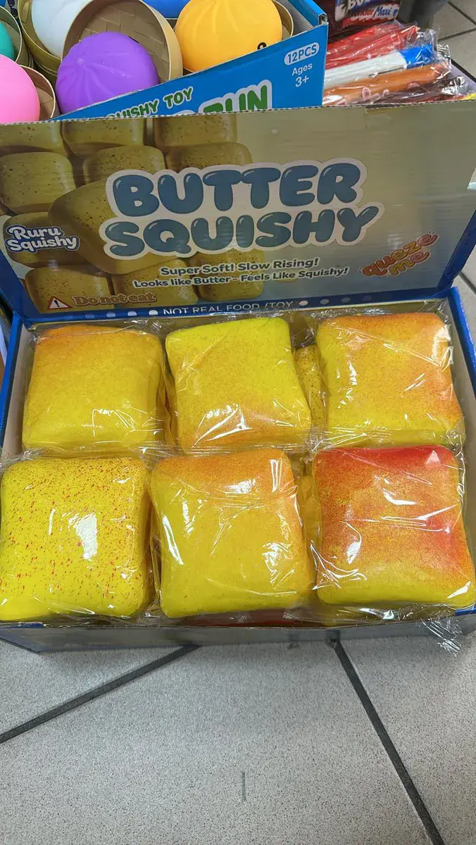 Butter Squishy miękka piankowa zabawka antystresowa żółto-pomarańczowa